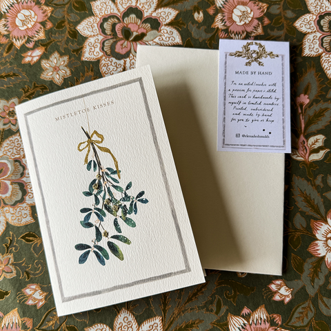 Greeting Card 'Mistletoe Kisses 2025' by Artist Elena Deshmukh