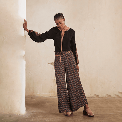 Black 'Gauri' Straight Leg Floral Print Floaty Pants by NKN Nekane - Curated Living