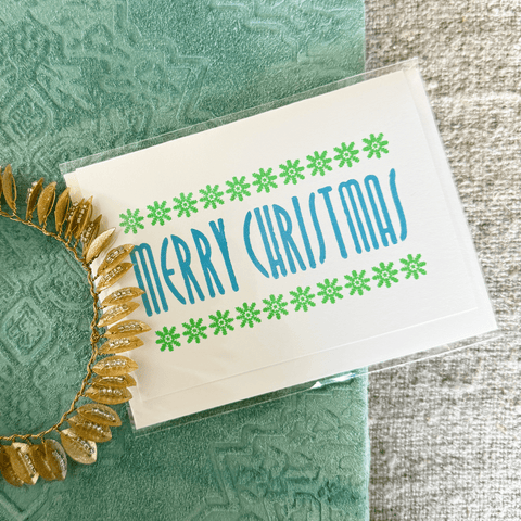 Greeting Card 'Light Blue Merry Christmas with Green Snowflakes' by Cold Ash Press - Curated Living