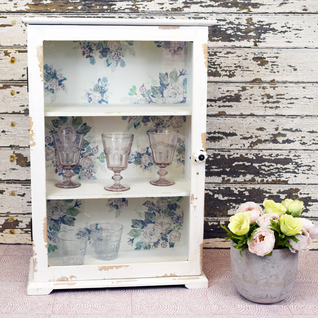 Antique White Wallpapered Cabinet.