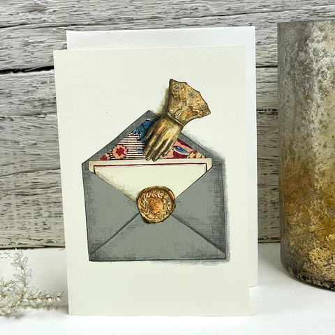 Golden Glove & Grey Envelope Card by Elena Deshmukh.