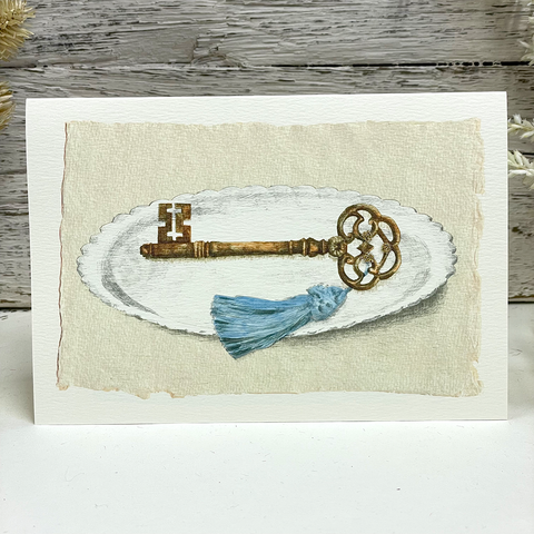 Gold Key on a Plate Card by Elena Deshmukh.