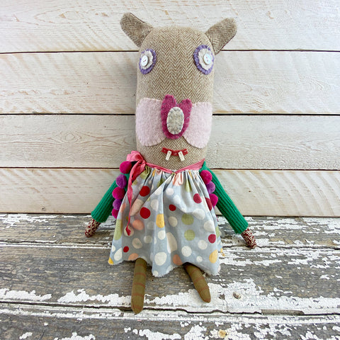 Valerie Weberpal creature with polka dot dress.